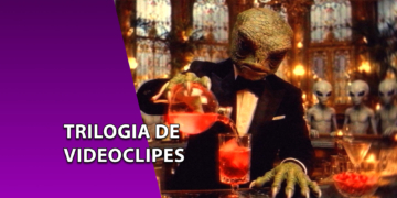 Imagem de um barman alienígena com cabeça de réptil servindo uma bebida vermelha. Ao fundo, três alienígenas cinzas clássicos. À esquerda, faixa roxa com o texto "TRILOGIA DE VIDEOCLIPES".